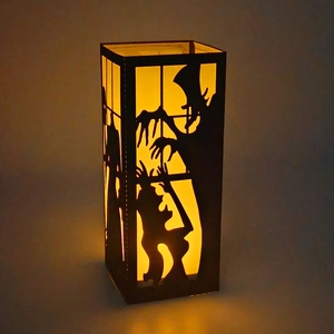 Halloween black paper lantern with warm LED light and gothic silhouette cutout patterns