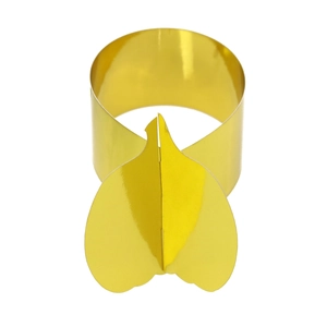 Close-up of golden pumpkin-shaped napkin ring with a polished metallic mirror finish