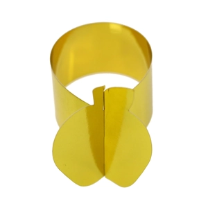Detailed close-up of golden apple-shaped napkin ring with a polished metallic mirror finish