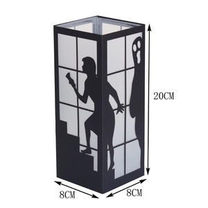 Detail view of 20cm black Halloween paper lantern with ghost silhouette and dimensions