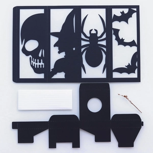 Detailed laser-cut Halloween card set with skull witch spider and bat hollow patterns