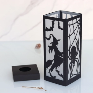 Halloween black paper lanterns with witch bat and spider cutouts for LED candles
