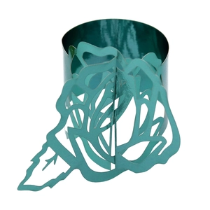Detail of laser-cut rose napkin ring in vibrant turquoise finish with hollow metal petals