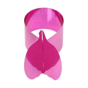 Close-up of rose pink metallic pumpkin leaf napkin ring with shiny mirror finish texture