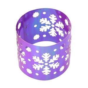 Macro view of purple iridescent snowflake cutout napkin ring for Christmas table decor