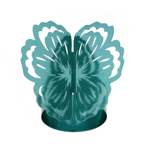 Detail of teal butterfly napkin ring with intricate laser-cut hollow wing design