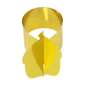 Detail of golden leaf napkin ring showing glossy metallic texture and joint structure