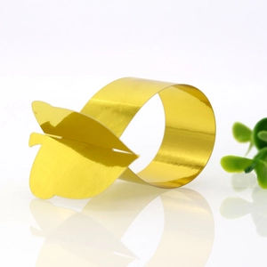 Golden butterfly napkin ring with mirror finish for elegant holiday party table decor