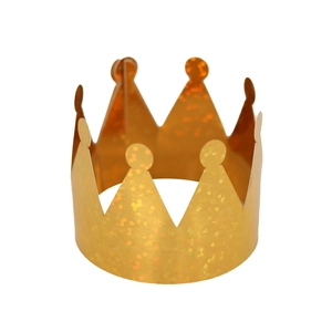 Detailed macro view of golden glitter crown paper napkin ring with shimmering texture