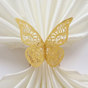 Golden butterfly napkin ring with glitter laser-cut lace design for wedding table decor