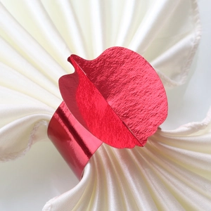 Metallic red pumpkin shape napkin ring made of reflective paper for festive table decor