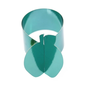 Macro view of teal metallic apple napkin ring with mirror finish on white background