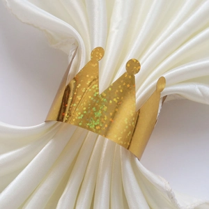 Sparkling gold crown napkin ring with glitter finish for elegant wedding table settings