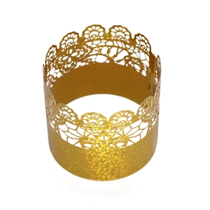 Detailed close-up of golden glitter laser-cut lace napkin ring with hollow patterns