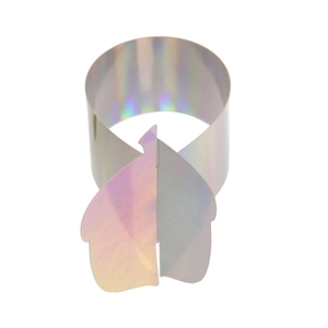 Macro view of holographic laser napkin ring with colorful metallic refraction effect