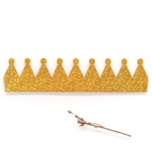 Detailed view of glittering golden crown napkin rings for elegant wedding table settings