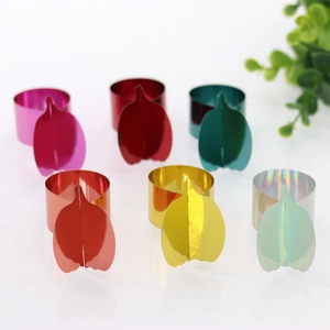 Polished mirror-finish pumpkin leaf napkin rings in vibrant assorted colors for table decor