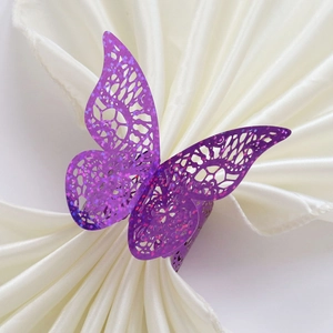 Elegant purple butterfly napkin ring with laser-cut hollow design and glitter finish