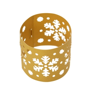 Detailed close-up of a laser-cut snowflake paper napkin ring with a golden mirror finish
