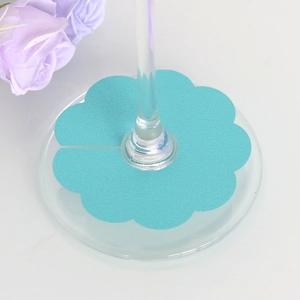 Teal flower-shaped card name tags for wine glass stems at weddings and parties