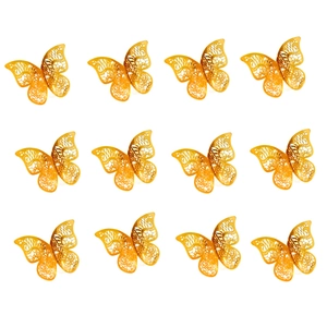 Set of 12 golden laser-cut butterfly napkin rings with intricate lace pattern details