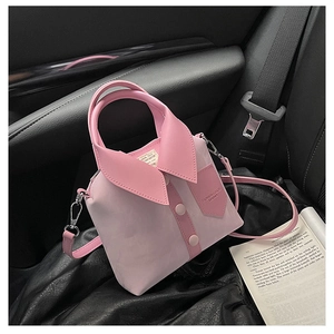 Detail of pink patchwork handbag with shirt collar design on car seat background