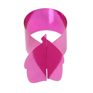 Detail of rose red mirror-finish napkin ring with cross-lock design for table decor