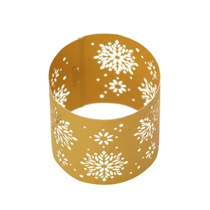 Macro shot of gold snowflake cutout napkin rings with intricate laser-cut festive details