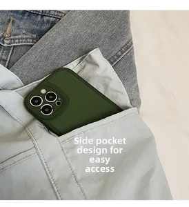 Detail view of dark green phone case in a side pocket for easy storage and access
