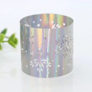Macro shot of laser hollow snowflake napkin ring with iridescent silver rainbow effect