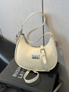 Chic cream crocodile pattern hobo bag with adjustable strap and silver metal detail