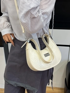 Chic cream white woven pattern crescent moon bag with adjustable shoulder strap