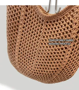 Close-up of brown woven tote bag featuring detailed mesh texture and soft inner lining