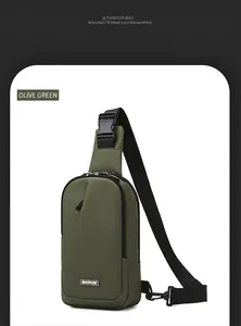Detail of dark green waterproof nylon chest bag featuring adjustable strap and MACHUGE logo
