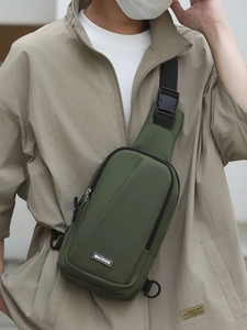 Olive green nylon chest bag with MACHUGE label and adjustable strap for outdoor sports