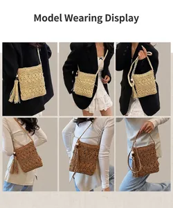 Detail of handmade straw crossbody bags with long fringe tassels and wooden beads decor