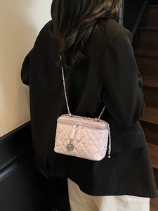 Pink quilted crossbody bag with diamond rhinestones and silver camellia pendant