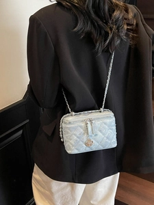 Light blue denim quilted crossbody box bag with crystal studs and chain strap