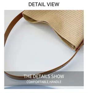 Detail showing high-quality straw weave texture and dark brown leather handle stitching