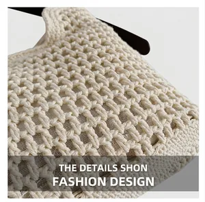Detail of hollow diamond pattern crochet on cream woven tote bag with inner lining