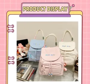 Three Korean-style casual backpacks in sky blue, pink, and beige with embroidery details