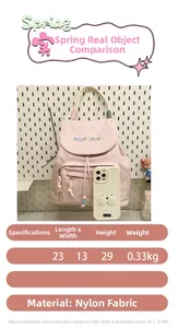 Detailed size chart for pink nylon backpack showing 23x13x29cm dimensions and material