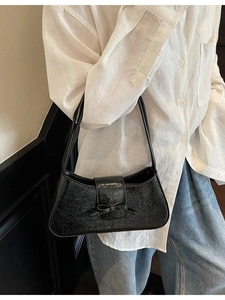 Retro black pleated leather underarm bag with bow decoration for women fashion