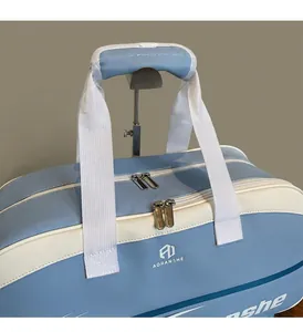 Close-up of blue and white fitness bag with sturdy handles and metal rack display