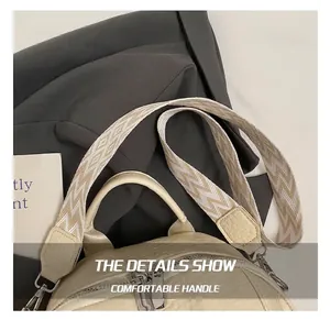 Detail of beige litchi leather backpack with geometric woven strap and double zippers