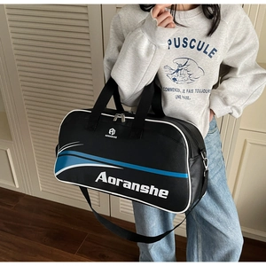 Close-up of black sports duffel bag featuring blue and white side stripes and Aoranshe logo