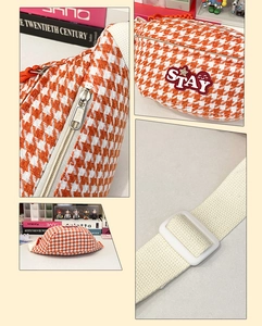 Détails d'un sac de poitrine à motif pied-de-poule orange avec broderie et sangle