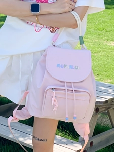 Pink waterproof nylon backpack with woven rope straps for casual travel and school