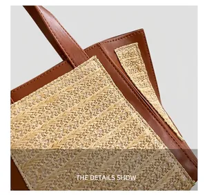 Detail showing the straw weave texture and brown leather stitching on the tote bag