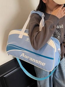 Light blue faux leather sports gym bag with white trim and detachable shoulder strap